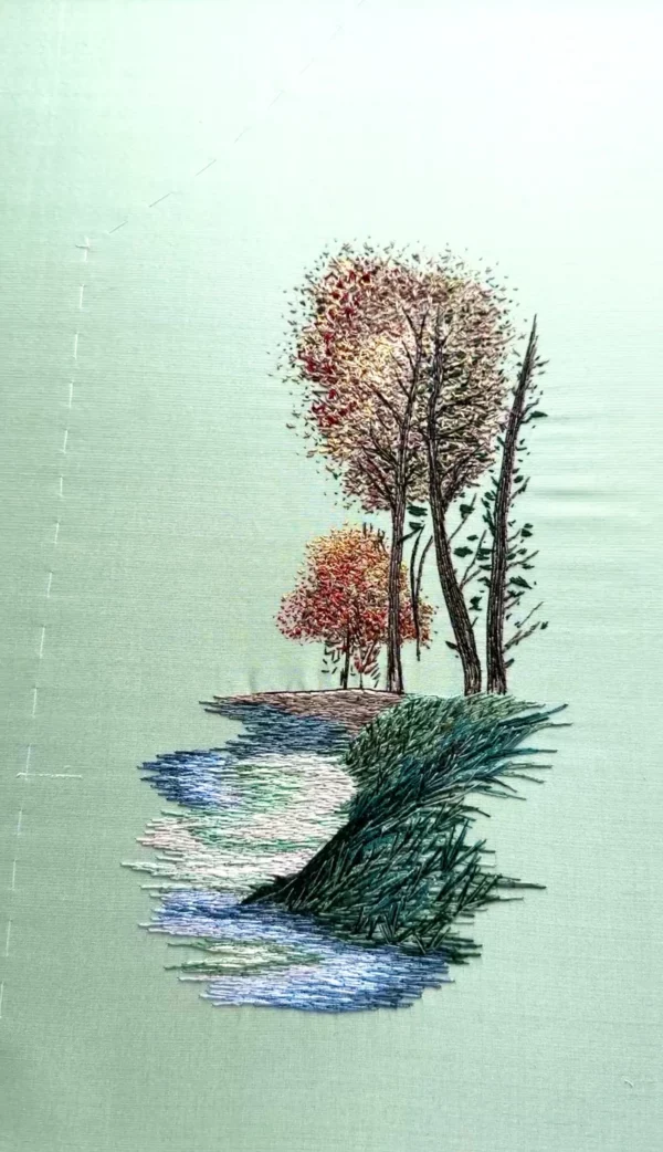 Broderie d'un paysage sur-mesure à partir d'une peinture. Broderie sur mesure.